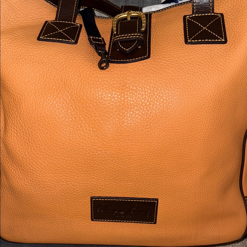 Dooney and Bourke, large Leather Tote Bag and cosmetic case